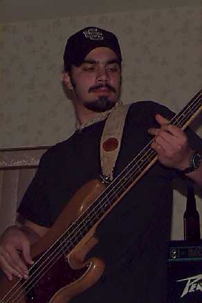 This is a picture
of Justin Corso playing his bass guitar.